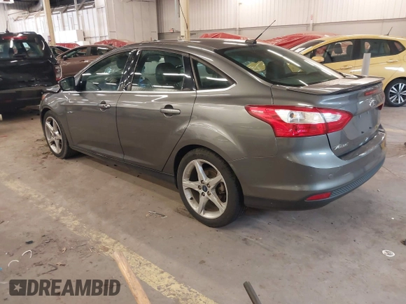 2013 Ford Focus Titanium with VIN 1FADP3J23DL265049, listed as a IAAI auction lot 41765621 with 100,550 mi miles and . Bid and sale history available at carsss.com. Image 3.