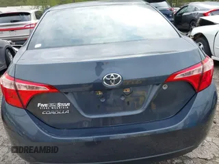 2019 Toyota Corolla L with VIN 5YFBURHE8KP936426, listed as a IAAI auction lot 42029018 with 190,163 mi miles and . Bid and sale history available at DreamBid. Image 16.