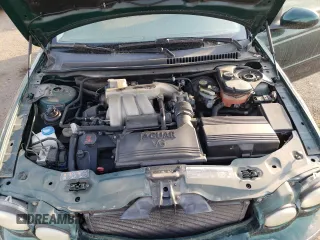 2004 Jaguar X-Type z VIN SAJEA51C04WD65097, wystawiony jako Copart lot #53825295 z przebiegiem 58 270 mil mil oraz Szkoda całkowita • Salvage title. Historia ofert i sprzedaży dostępna na DreamBid. Obrazek 11.