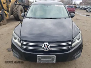 2012 Volkswagen Tiguan SE z VIN WVGAV7AX5CW563536, wystawiony jako Copart lot #52407665 z przebiegiem 136 263 mil mil oraz Szkody całkowita. Historia ofert i sprzedaży dostępna na DreamBid. Obrazek 5.