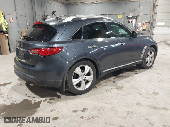 2010 Infiniti FX with VIN JN8AS1MW7AM853691, listed as a IAAI auction lot 41952368 with 198,659 mi miles. Bid and sale history available at carsss.com. Image 4.