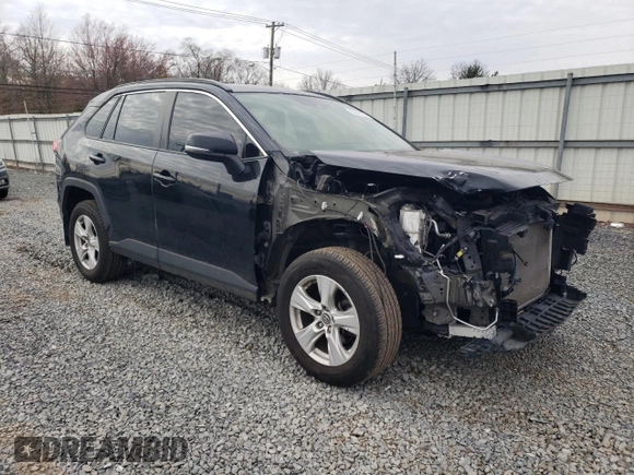2019 Toyota RAV4 XLE with VIN JTMP1RFV9KD506960, listed as a Copart auction lot 50242025 with 102,157 mi miles and Salvage Title. Bid and sale history available at DreamBid. Image 4.