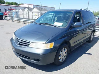 2004 Honda Odyssey EX with VIN 5FNRL18684B027564, listed as a IAAI auction lot 42044126 with 185,627 mi miles and . Bid and sale history available at DreamBid. Image 2.