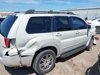 2004 Mitsubishi Endeavor Limited z VIN 4A4MM41S34E001920, wystawiony jako IAAI lot #42172909 z przebiegiem 196 140 mil mil oraz . Historia ofert i sprzedaży dostępna na DreamBid. Obrazek 14.