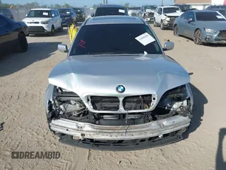 2002 BMW 3 Series 325i with VIN WBAEV33412KL55500, listed as a IAAI auction lot 42008308 with 172,852 mi miles. Bid and sale history available at carsss.com. Image 6.