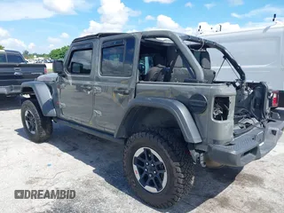 2019 Jeep Wrangler Unlimited Rubicon with VIN 1C4HJXFN9KW507281, listed as a IAAI auction lot 42695939 with 60,802 mi miles and . Bid and sale history available at DreamBid. Image 3.