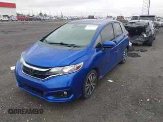 2018 Honda Fit EX with VIN 3HGGK5H88JM718508, listed as a IAAI auction lot 42181101 with 116,446 mi miles and . Bid and sale history available at DreamBid. Image 2.
