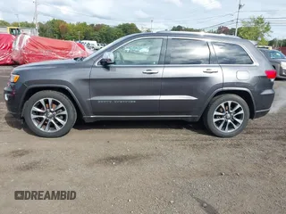 2018 Jeep Grand Cherokee High Altitude with VIN 1C4RJFCGXJC440470, listed as a IAAI auction lot 40459789 with 126,854 mi miles and . Bid and sale history available at DreamBid. Image 14.