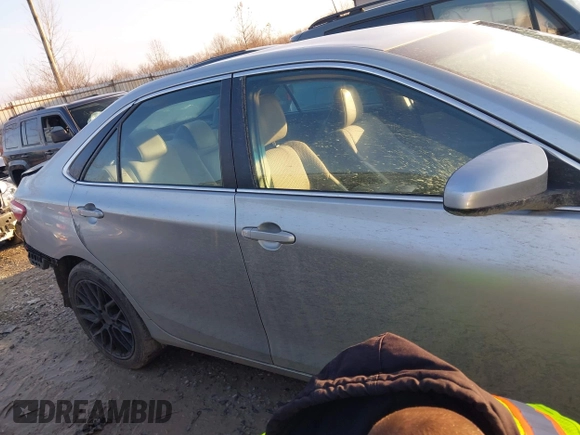 2015 Toyota Camry XLE with VIN 4T1BF1FK1FU099964, listed as a IAAI auction lot 41211645 with 209,364 mi miles and . Bid and sale history available at DreamBid. Image 13.