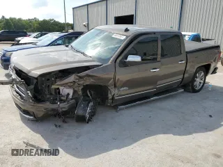2014 Chevrolet Silverado 1500 High Country with VIN 3GCUKTEC6EG438556, listed as a Copart auction lot 54818993 with 91,398 mi miles and Salvage Title. Bid and sale history available at DreamBid. Image 1.