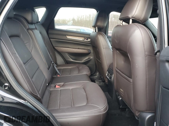2024 Mazda CX-5 2.5 Turbo Signature with VIN JM3KFBXY7R0515256, listed as a Copart auction lot 87404694 with 4,699 mi miles and Salvage Title. Bid and sale history available at carsss.com. Image 11.