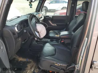 2013 Jeep Wrangler Unlimited Sport with VIN 1C4BJWDG1DL601972, listed as a Copart auction lot 65069824 with 166,274 mi miles and Salvage Title. Bid and sale history available at carsss.com. Image 7.