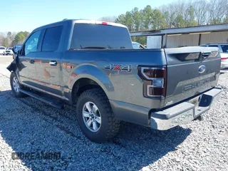 2018 Ford F-150 XL with VIN 1FTEW1E56JFC63963, listed as a IAAI auction lot 41776075 with 176,140 mi miles. Bid and sale history available at carsss.com. Image 3.