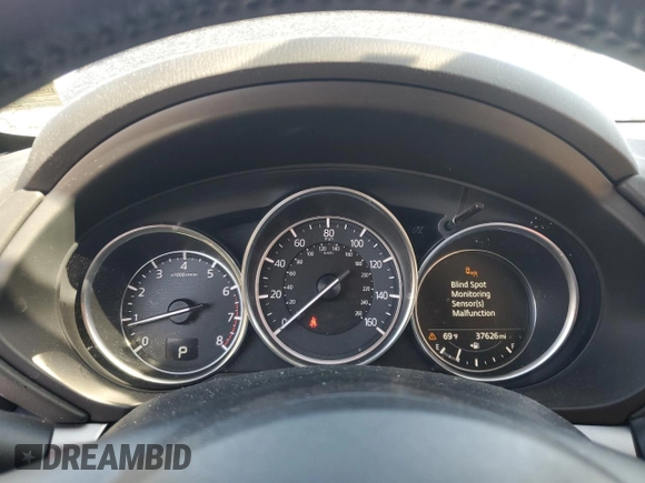 2018 Mazda CX-5 Touring with VIN JM3KFBCM6J0308848, listed as a Copart auction lot 47360695 with 37,626 mi miles and Salvage Title. Bid and sale history available at DreamBid. Image 9.