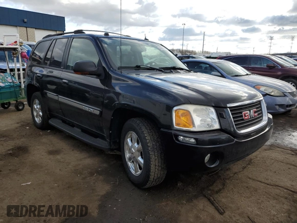 2005 GMC Envoy SLT with VIN 1GKDT13S352366014, listed as a Copart auction lot 43006165 with 126,721 mi miles and Clean Title. Bid and sale history available at carsss.com. Image 4.