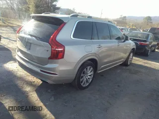 2016 Volvo XC90 T6 Momentum with VIN YV4A22PK7G1034763, listed as a IAAI auction lot 41590080 with 132,508 mi miles. Bid and sale history available at carsss.com. Image 4.
