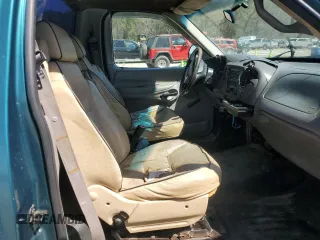 1998 Ford F-150 z VIN 1FTZF176XWNB03959, wystawiony jako Copart lot #49043105 z przebiegiem 300 884 mil mil oraz Szkoda całkowita • Salvage title. Historia ofert i sprzedaży dostępna na DreamBid. Obrazek 11.