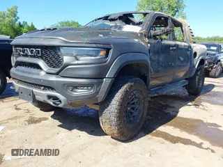 2022 Ram 1500 TRX with VIN 1C6SRFU99NN151639, listed as a IAAI auction lot 42145733 with Not provided miles and . Bid and sale history available at DreamBid. Image 2.