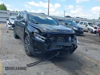 2021 GMC Acadia SLT with VIN 1GKKNMLS0MZ136228, listed as a IAAI auction lot 42445381 with 65,700 mi miles and . Bid and sale history available at DreamBid. Image 1.