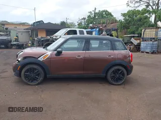 2014 MINI Countryman with VIN WMWZB3C51EWR36737, listed as a IAAI auction lot 41741248 with 69,717 mi miles and . Bid and sale history available at DreamBid. Image 15.
