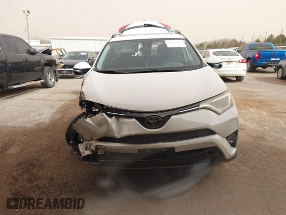 2018 Toyota RAV4 XLE with VIN JTMWFREV2JJ730568, listed as a IAAI auction lot 41814302 with 108,622 mi miles and . Bid and sale history available at DreamBid. Image 11.