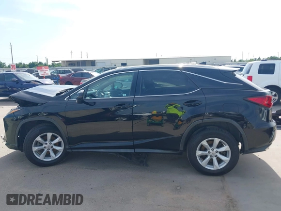 2016 Lexus RX 350 z VIN 2T2BZMCA4GC047800, wystawiony jako IAAI lot #42270406 z przebiegiem 112 181 mil mil oraz . Historia ofert i sprzedaży dostępna na DreamBid. Obrazek 14.