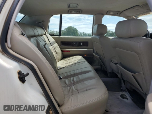 1996 Cadillac Fleetwood z VIN 1G6DW52P1TR715038, wystawiony jako Copart lot #69987194 z przebiegiem Nie podano mil oraz Szkody całkowita. Historia ofert i sprzedaży dostępna na DreamBid. Obrazek 10.