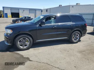 2017 Dodge Durango SXT with VIN 1C4RDHAG1HC771003, listed as a Copart auction lot 65729325 with 87,283 mi miles and Clean title. Bid and sale history available at DreamBid. Image 1.