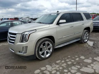 2015 Cadillac Escalade z VIN 1GYS4AKJ1FR100437, wystawiony jako Copart lot #52559965 z przebiegiem 51 627 mil mil oraz Tytuł czysty. Historia ofert i sprzedaży dostępna na DreamBid. Obrazek 1.