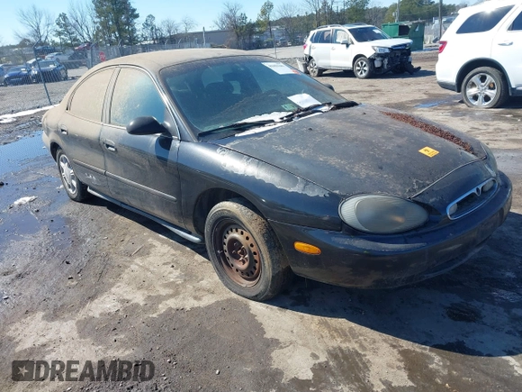 1997 Mercury Sable GS with VIN 1MELM50U7VA656293, listed as a IAAI auction lot 41651281 with 136,024 mi miles and . Bid and sale history available at DreamBid. Image 1.