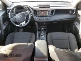 2018 Toyota RAV4 XLE with VIN 2T3WFREV0JW517488, listed as a Copart auction lot 51000975 with 68,105 mi miles and Salvage title. Bid and sale history available at DreamBid. Image 8.