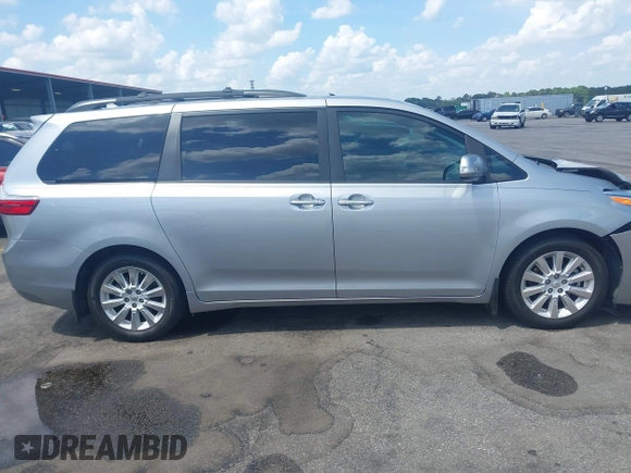 2015 Toyota Sienna XLE with VIN 5TDYK3DC5FS685735, listed as a IAAI auction lot 42139229 with 87,694 mi miles and . Bid and sale history available at DreamBid. Image 13.