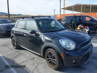 2015 MINI Countryman S z VIN WMWZC3C55FWT04354, wystawiony jako IAAI lot #41346143 z przebiegiem Nie podano mil oraz . Historia ofert i sprzedaży dostępna na DreamBid. Obrazek 1.