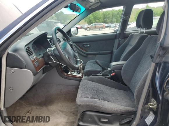 2002 Subaru Legacy Outback with VIN 4S3BH665327623842, listed as a Copart auction lot 60168375 with 113,761 mi miles and Salvage title. Bid and sale history available at DreamBid. Image 7.