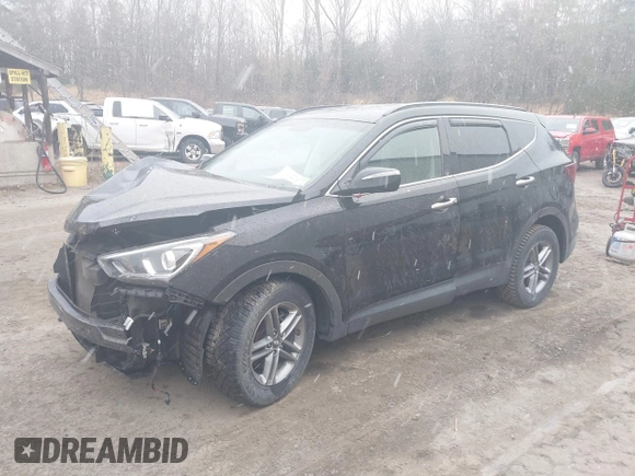 2018 Hyundai Santa Fe 2.4L z VIN 5NMZUDLB7JH098638, wystawiony jako IAAI lot #42055793 z przebiegiem 63 516 mil mil oraz . Historia ofert i sprzedaży dostępna na DreamBid. Obrazek 17.