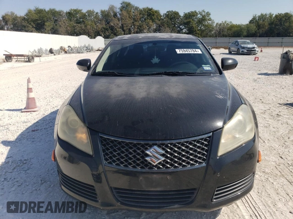 2011 Suzuki Kizashi SE z VIN JS2RE9A34B6111601, wystawiony jako Copart lot #75945784 z przebiegiem 128 926 mil mil oraz Szkoda całkowita • Salvage title. Historia ofert i sprzedaży dostępna na DreamBid. Obrazek 5.