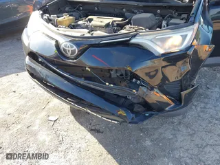2017 Toyota RAV4 LE with VIN 2T3BFREV6HW579227, listed as a IAAI auction lot 42001564 with 150,431 mi miles. Bid and sale history available at carsss.com. Image 6.