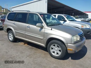 2003 Suzuki XL7 Touring z VIN JS3TX92V934108735, wystawiony jako IAAI lot #42619992 z przebiegiem 156 591 mil mil oraz . Historia ofert i sprzedaży dostępna na DreamBid. Obrazek 1.