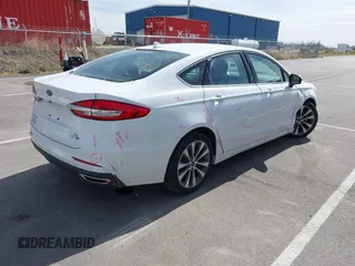 2020 Ford Fusion SE with VIN 3FA6P0T92LR249765, listed as a IAAI auction lot 41789244 with 50,027 mi miles and . Bid and sale history available at DreamBid. Image 4.