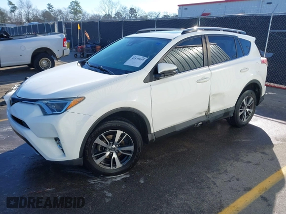 2018 Toyota RAV4 XLE with VIN JTMWFREV7JJ743297, listed as a IAAI auction lot 41579019 with 102,442 mi miles. Bid and sale history available at carsss.com. Image 17.