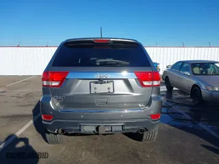 2013 Jeep Grand Cherokee Overland Summit with VIN 1C4RJFCT7DC585841, listed as a IAAI auction lot 41401170 with 122,719 mi miles. Bid and sale history available at carsss.com. Image 16.