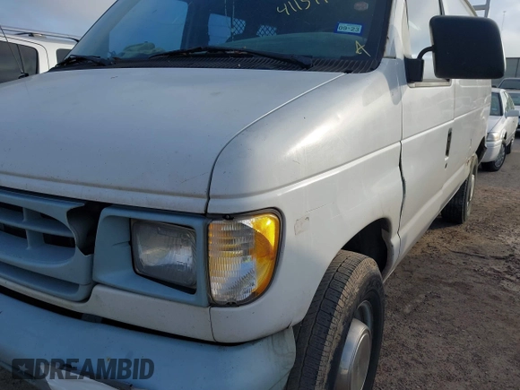 1999 Ford Econoline Cargo Commercial with VIN 1FTNE24L3XHB84868, listed as a IAAI auction lot 41151145 with 450,651 mi miles and . Bid and sale history available at carsss.com. Image 6.