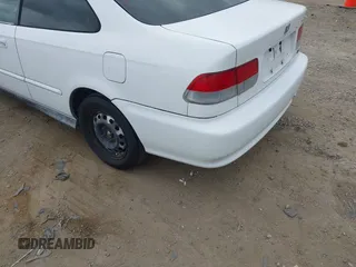 1997 Honda Civic EX z VIN 1HGEJ8143VL028501, wystawiony jako IAAI lot #42058395 z przebiegiem 129 401 mil mil oraz . Historia ofert i sprzedaży dostępna na DreamBid. Obrazek 13.