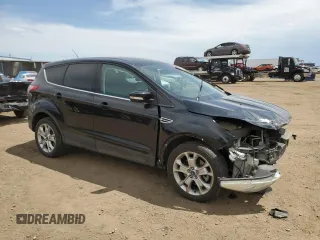 2013 Ford Escape SEL с VIN 1FMCU9H92DUA09513, выставлен на аукционе Copart как лот 60908785 с пробегом 82 348 миль миль и Списание • Salvage title. История ставок и продаж доступна на DreamBid. Изображение 4.