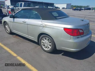 2009 Chrysler Sebring Touring with VIN 1C3LC55D99N574422, listed as a IAAI auction lot 42595676 with 141,603 mi miles and . Bid and sale history available at DreamBid. Image 3.
