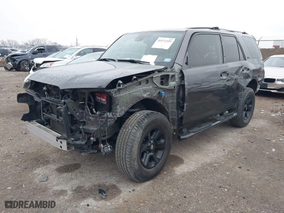 2020 Toyota 4Runner SR5 with VIN JTEBU5JR2L5779671, listed as a IAAI auction lot 41572359 with 87,458 mi miles. Bid and sale history available at carsss.com. Image 2.