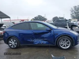 2022 Tesla Model Y Long Range with VIN 7SAYGDEE8NF511395, listed as a IAAI auction lot 41595310 with 65,156 mi miles and . Bid and sale history available at carsss.com. Image 13.