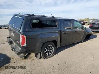 2017 GMC Canyon z VIN 1GTP6CE1XH1252005, wystawiony jako Copart lot #74982794 z przebiegiem 62 797 mil mil oraz Szkoda całkowita • Salvage title. Historia ofert i sprzedaży dostępna na DreamBid. Obrazek 3.