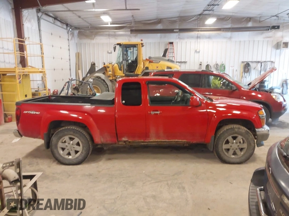 2011 GMC Canyon z VIN 1GTJ6NFE1B8109333, wystawiony jako IAAI lot #42035352 z przebiegiem 135 403 mil mil oraz . Historia ofert i sprzedaży dostępna na DreamBid. Obrazek 13.