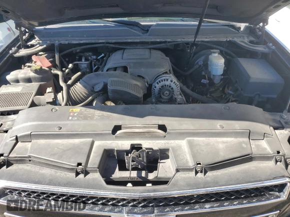 2014 Chevrolet Suburban LT with VIN 1GNSKJE71ER227075, listed as a Copart auction lot 76675654 with 214,113 mi miles and Salvage Title. Bid and sale history available at DreamBid. Image 12.